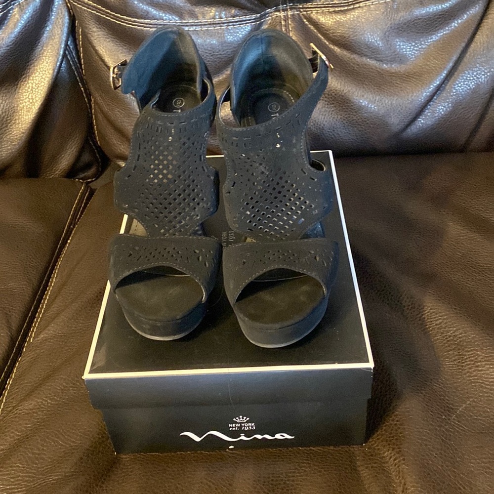 Black heeled wedges